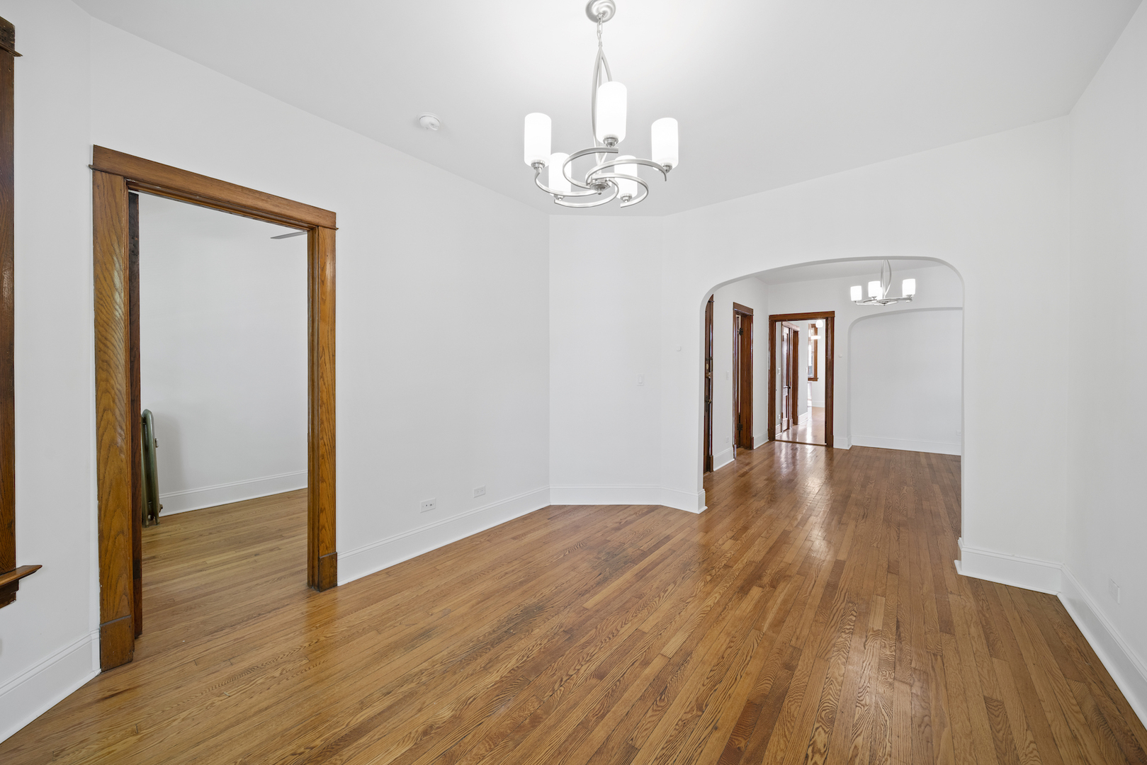 2545 West Walton Street, Unit 2 Chicago, IL 60622 - Photo 3 of 20 a view of empty room with wooden floor