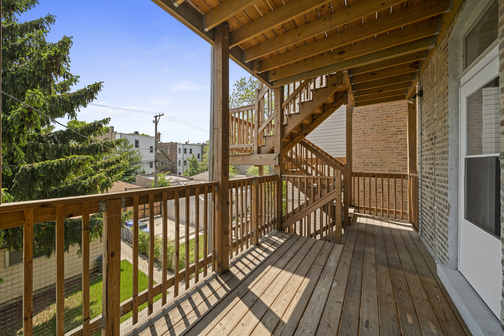2545 West Walton Street, Unit 2 Chicago, IL 60622 - Photo 8 of 20 a view of balcony with wooden floor