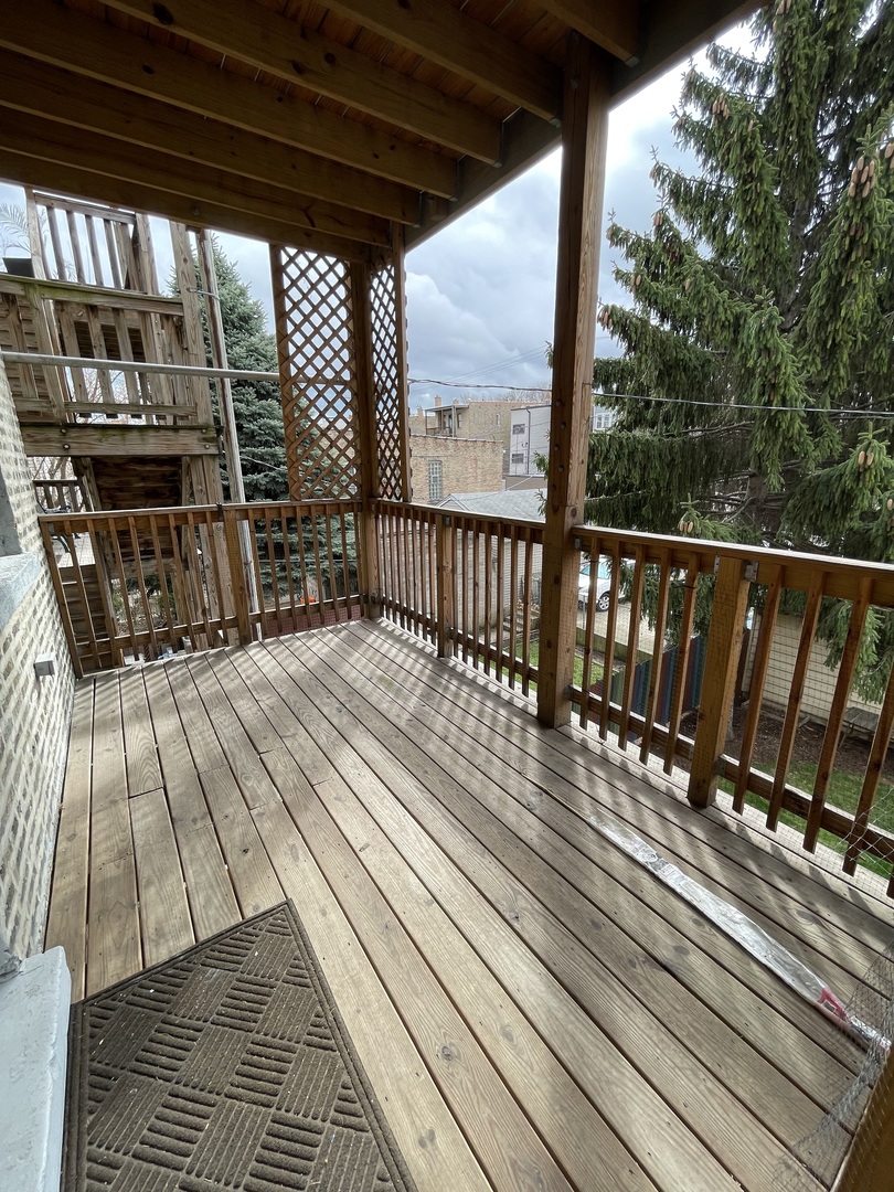 2545 West Walton Street, Unit 2 Chicago, IL 60622 - Photo 9 of 20 a view of balcony with wooden floor