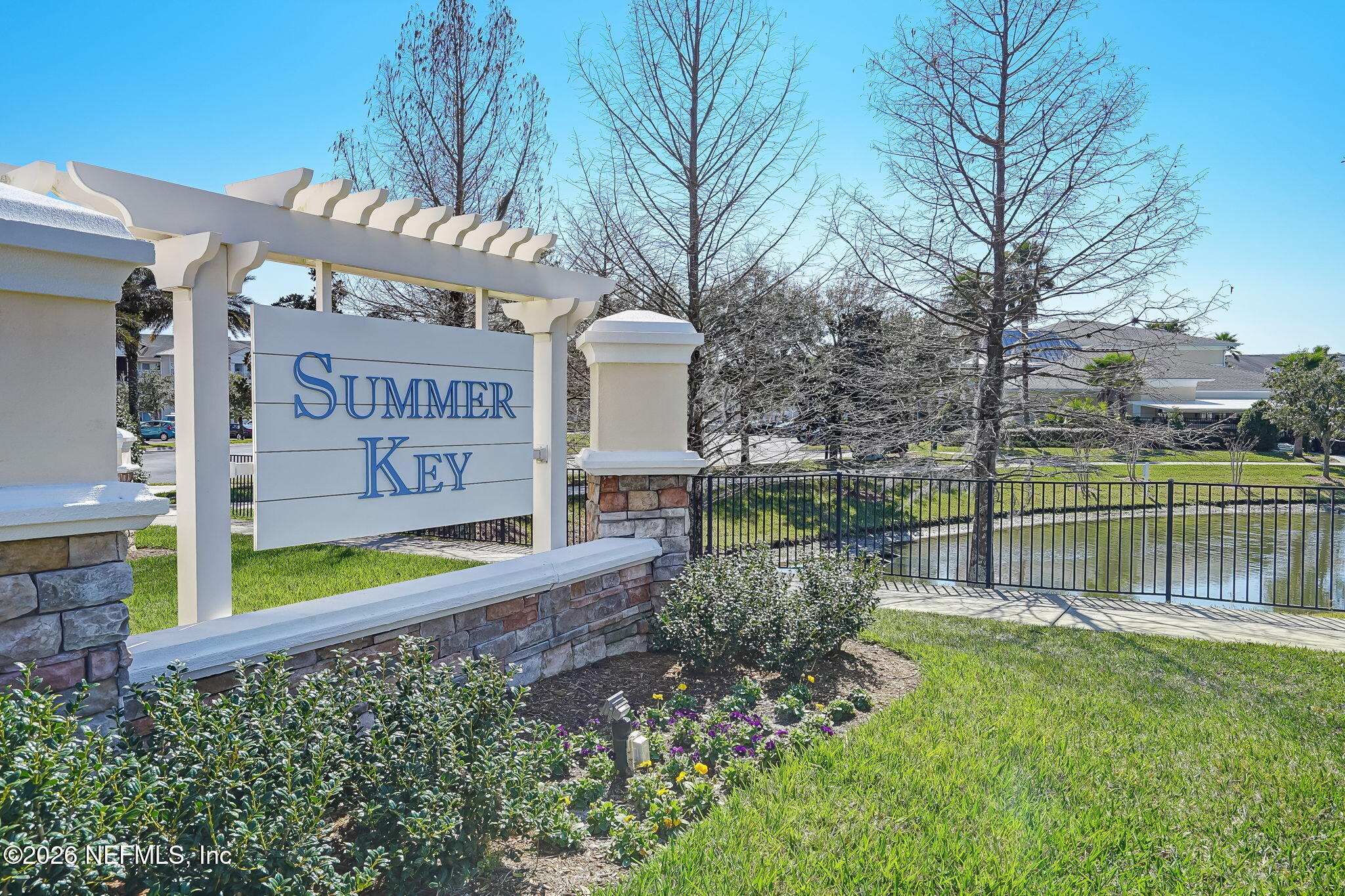 8215 Green Parrot Road, Unit 106 Jacksonville, FL 32256 - Photo 1 of 76 a view of a park with iron fence