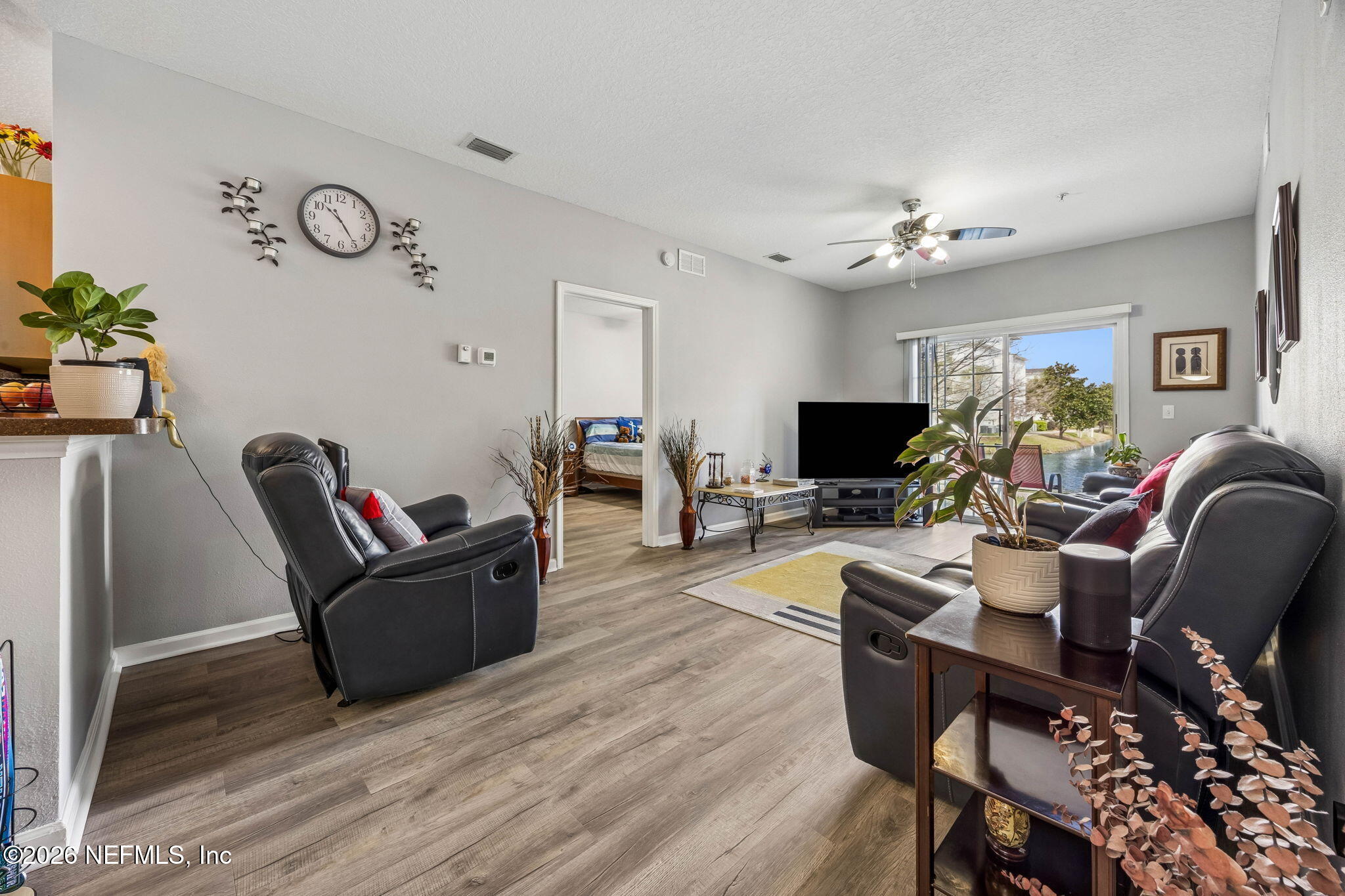 8215 Green Parrot Road, Unit 106 Jacksonville, FL 32256 - Photo 12 of 76 a living room with furniture