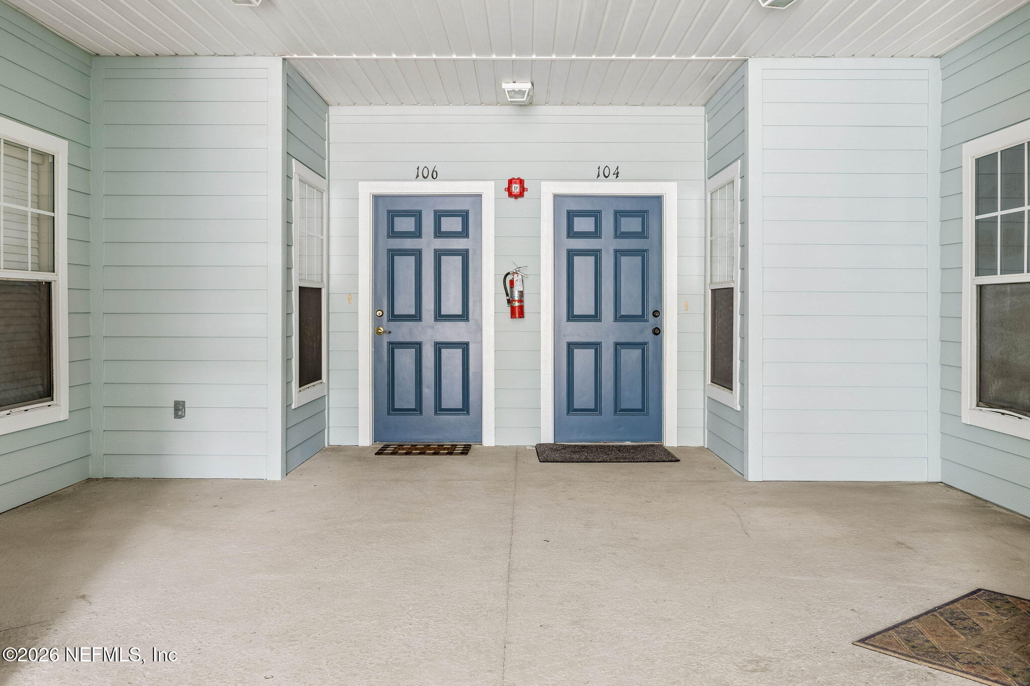 8215 Green Parrot Road, Unit 106 Jacksonville, FL 32256 - Photo 2 of 76 an entryway with an empty room