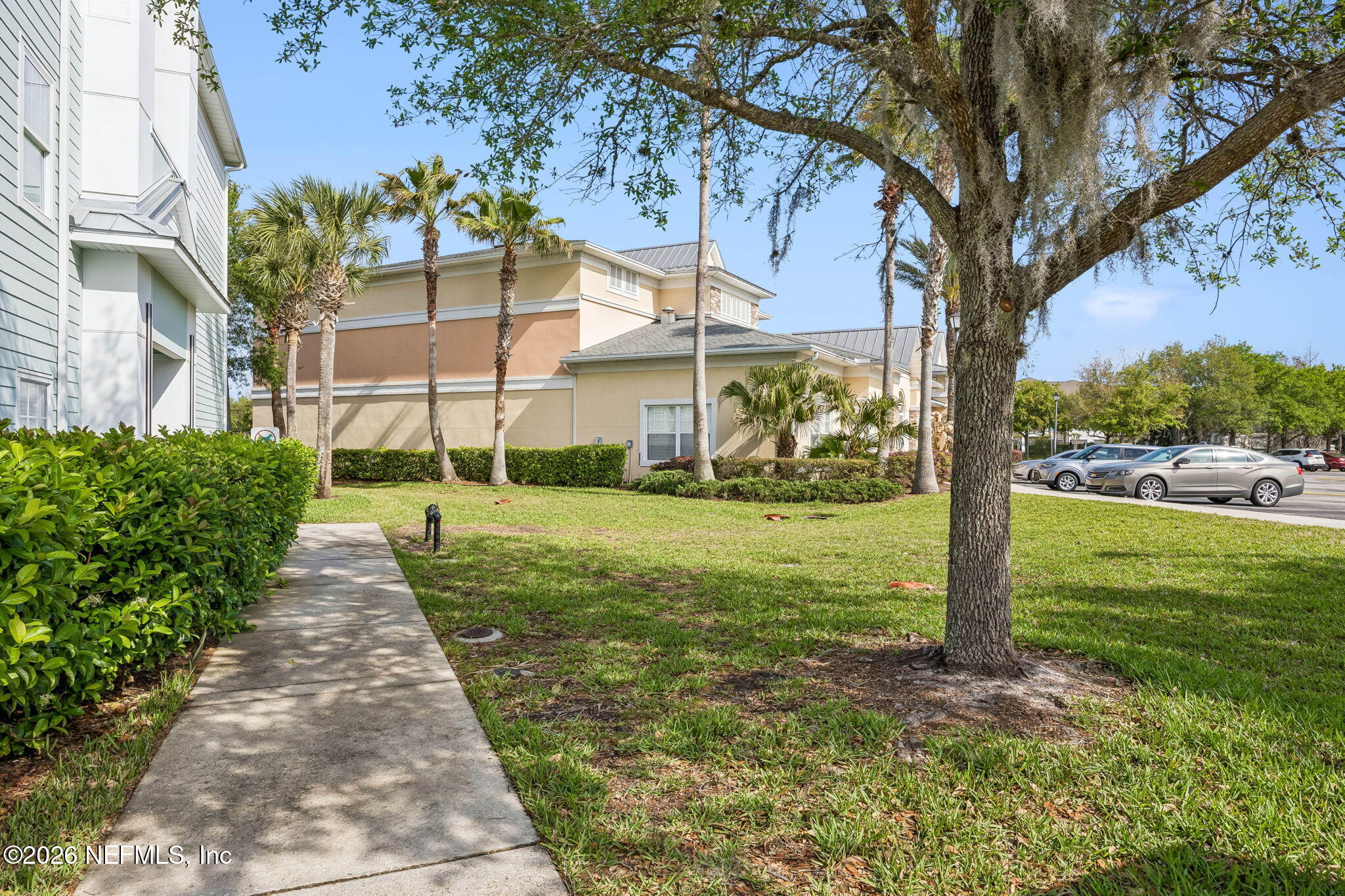 8215 Green Parrot Road, Unit 106 Jacksonville, FL 32256 - Photo 30 of 76 a view of a garden with pathway