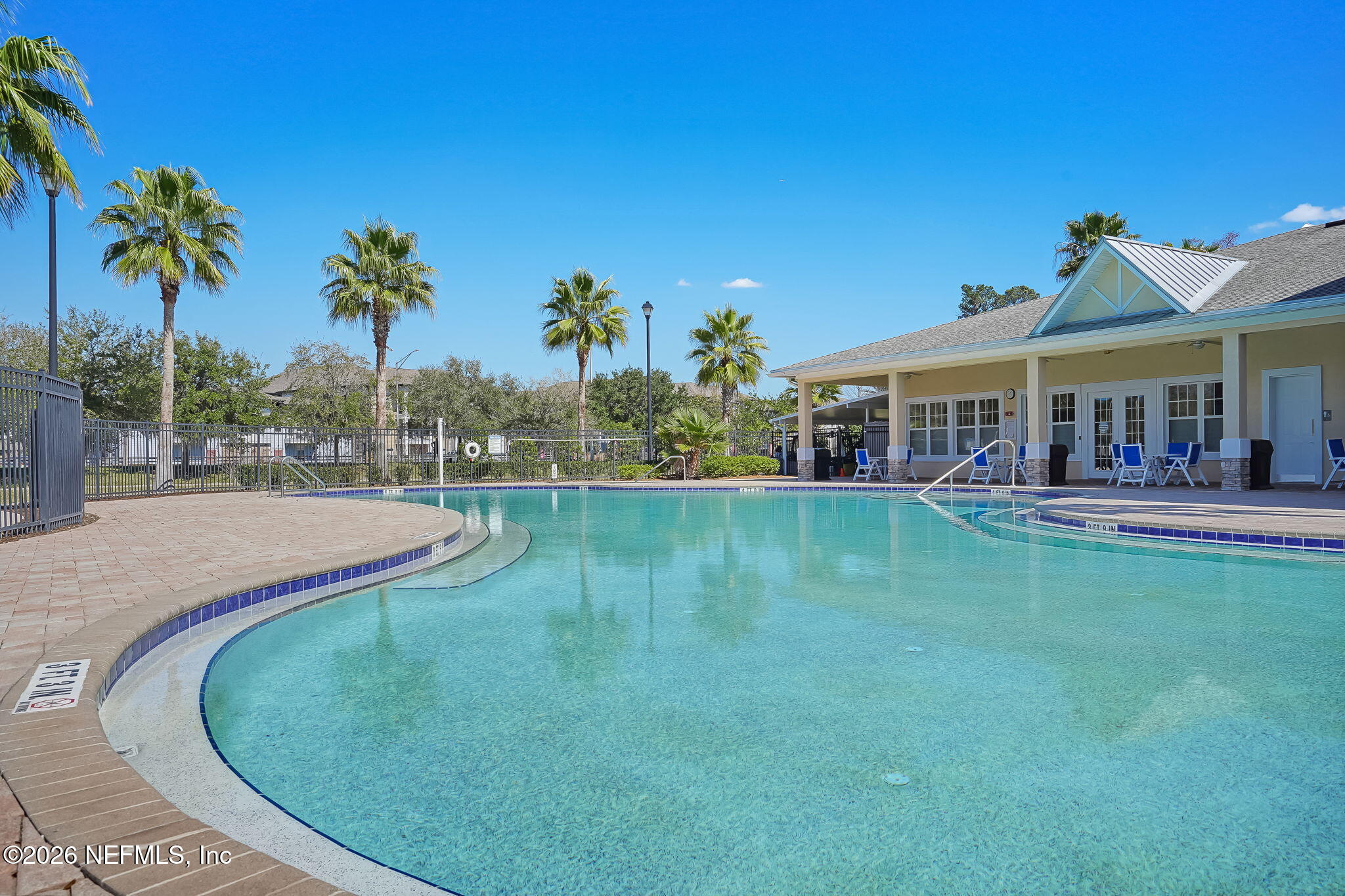 8215 Green Parrot Road, Unit 106 Jacksonville, FL 32256 - Photo 38 of 76 a swimming pool view with a garden space