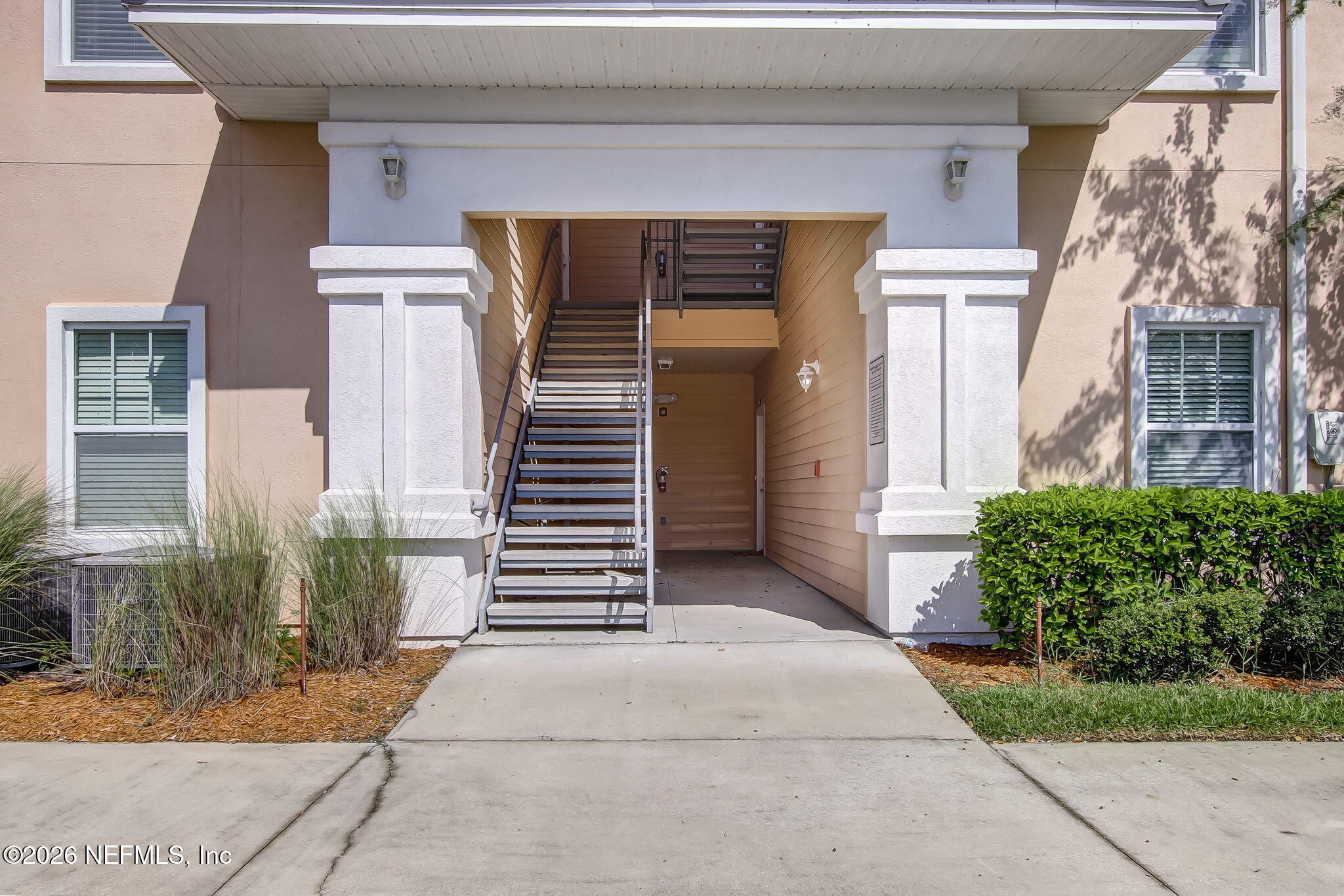 8215 Green Parrot Road, Unit 106 Jacksonville, FL 32256 - Photo 66 of 76 a view of a house with a yard