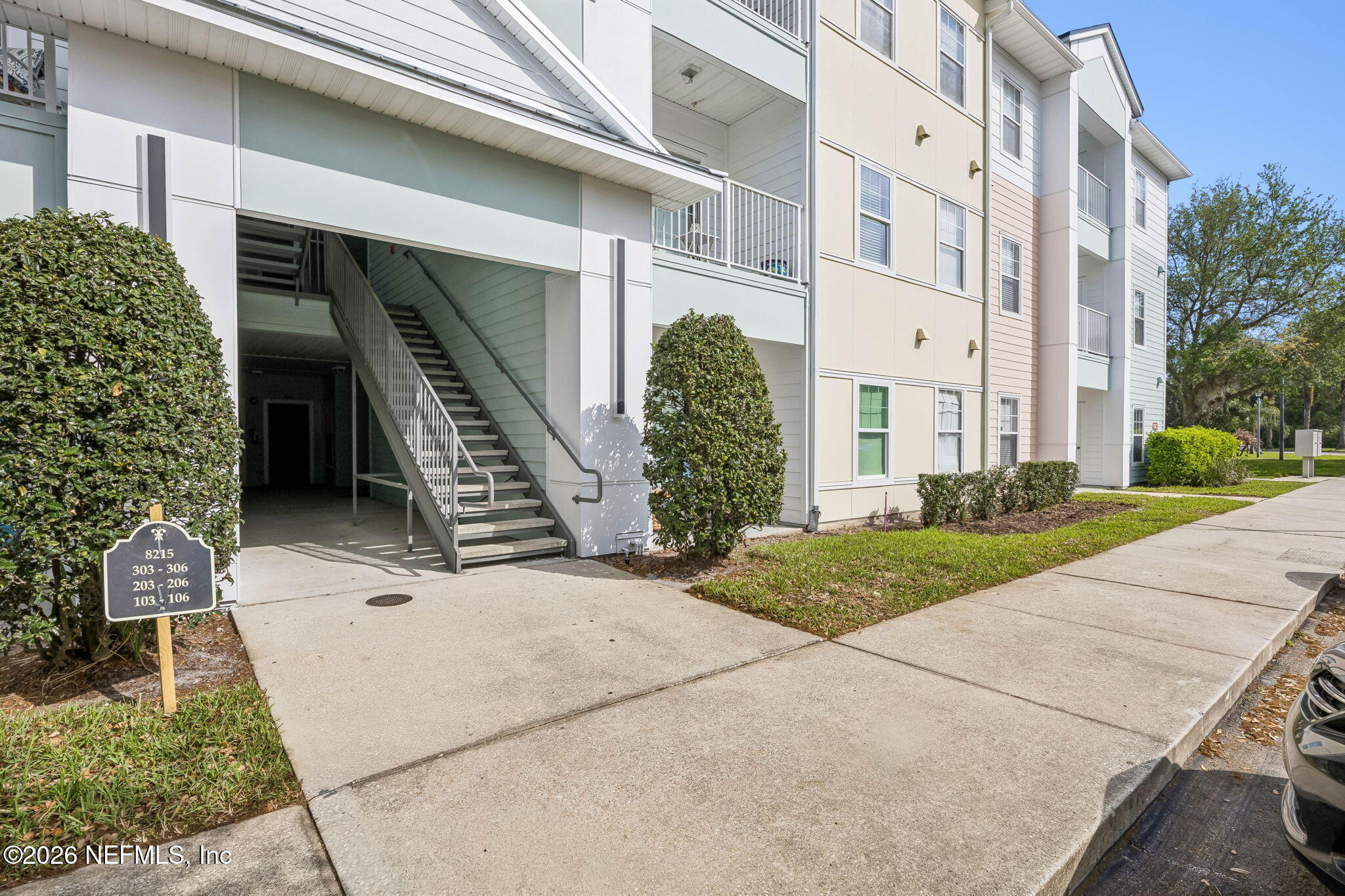 8215 Green Parrot Road, Unit 106 Jacksonville, FL 32256 - Photo 70 of 76 a view of a house with a yard