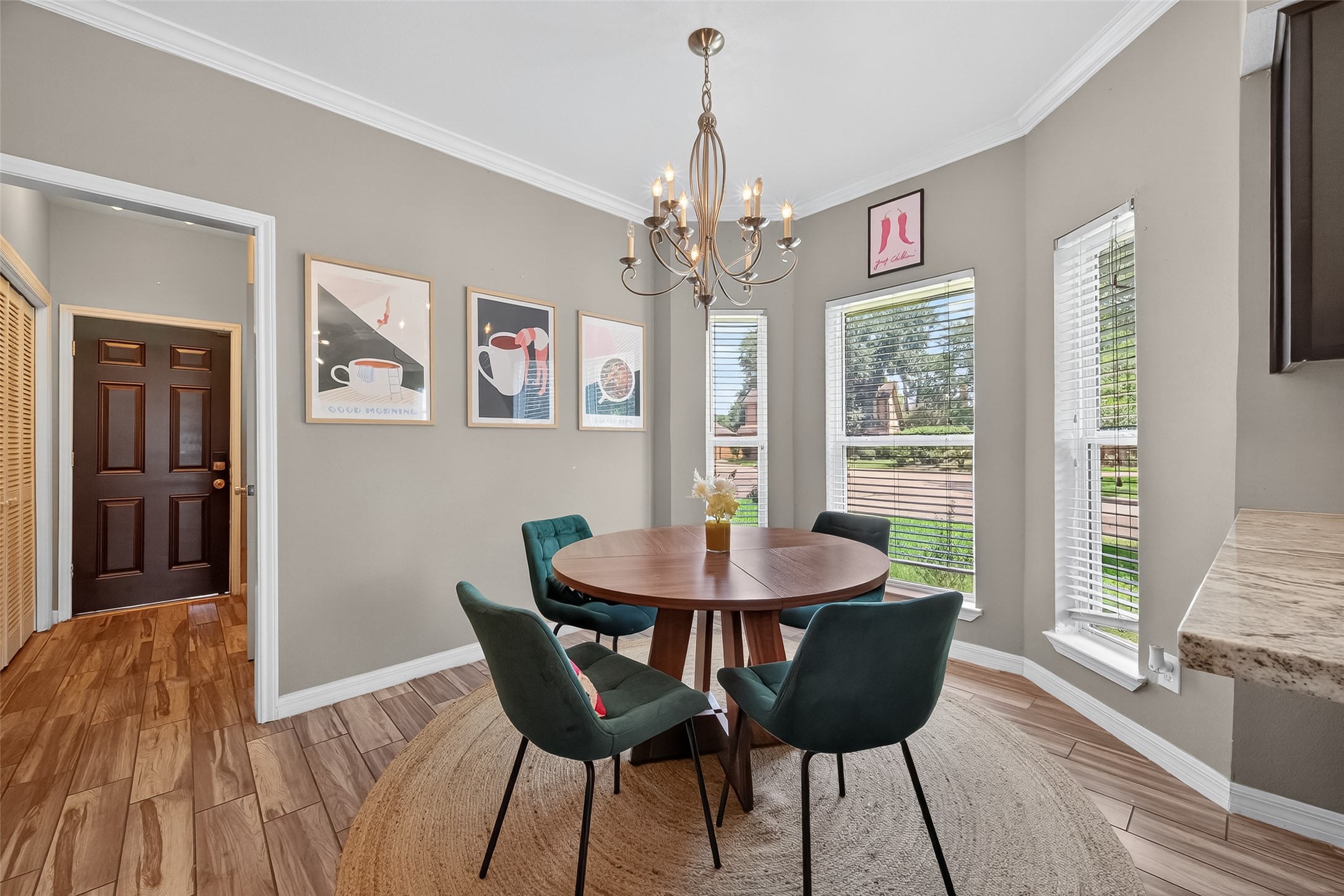 5310 Holly View Drive Houston, TX 77091 - Photo 11 of 38 a view of a dining room with furniture window and wooden floor