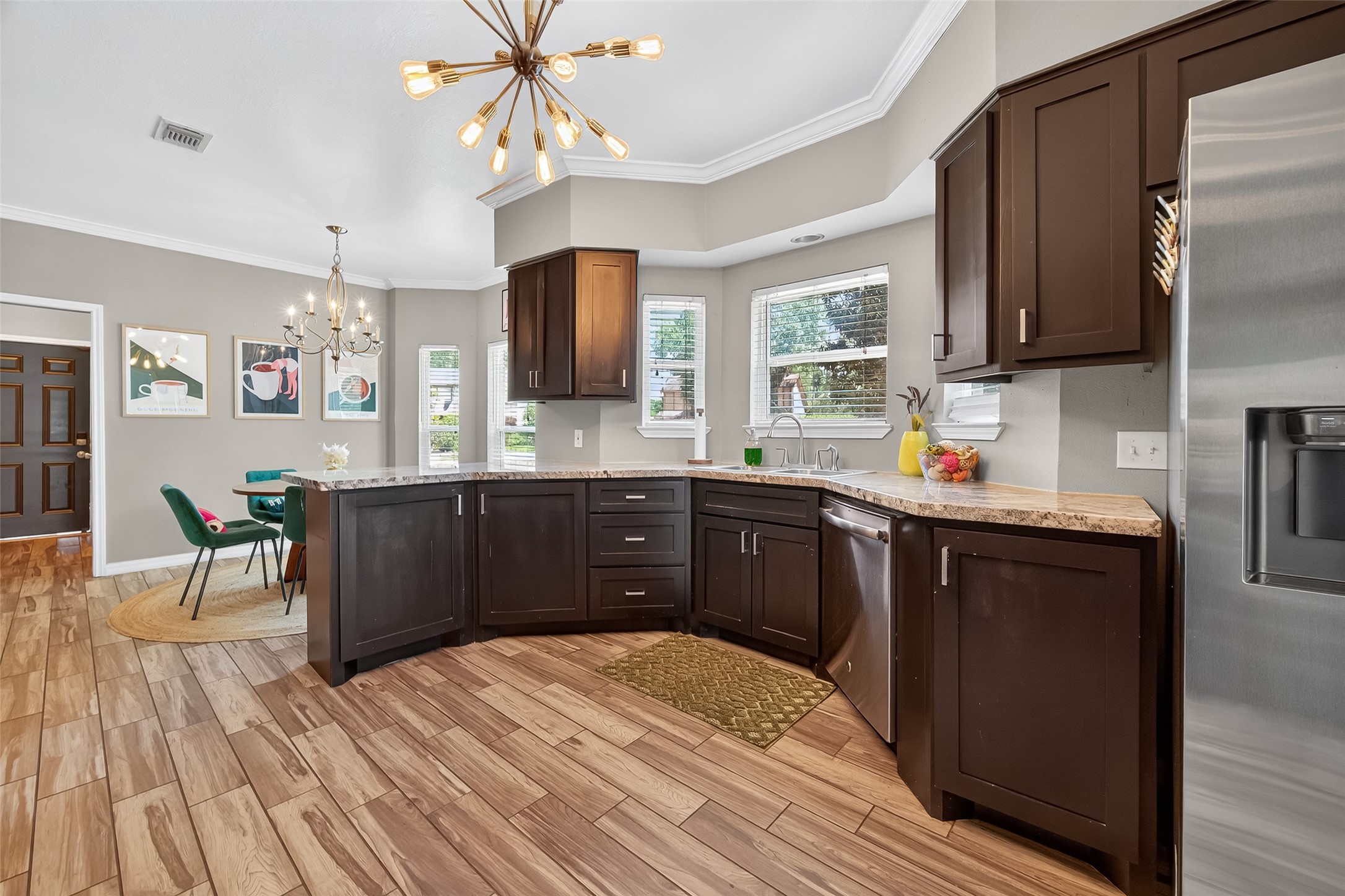 5310 Holly View Drive Houston, TX 77091 - Photo 17 of 38 a kitchen with a sink stove and refrigerator