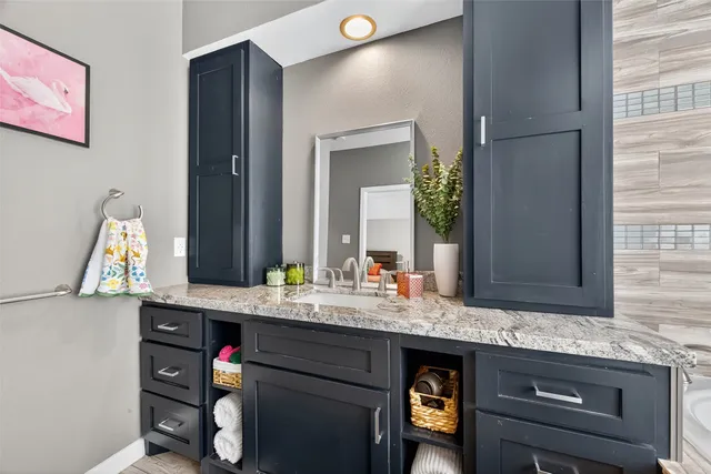 a view of a patio with table and chairs and potted plants