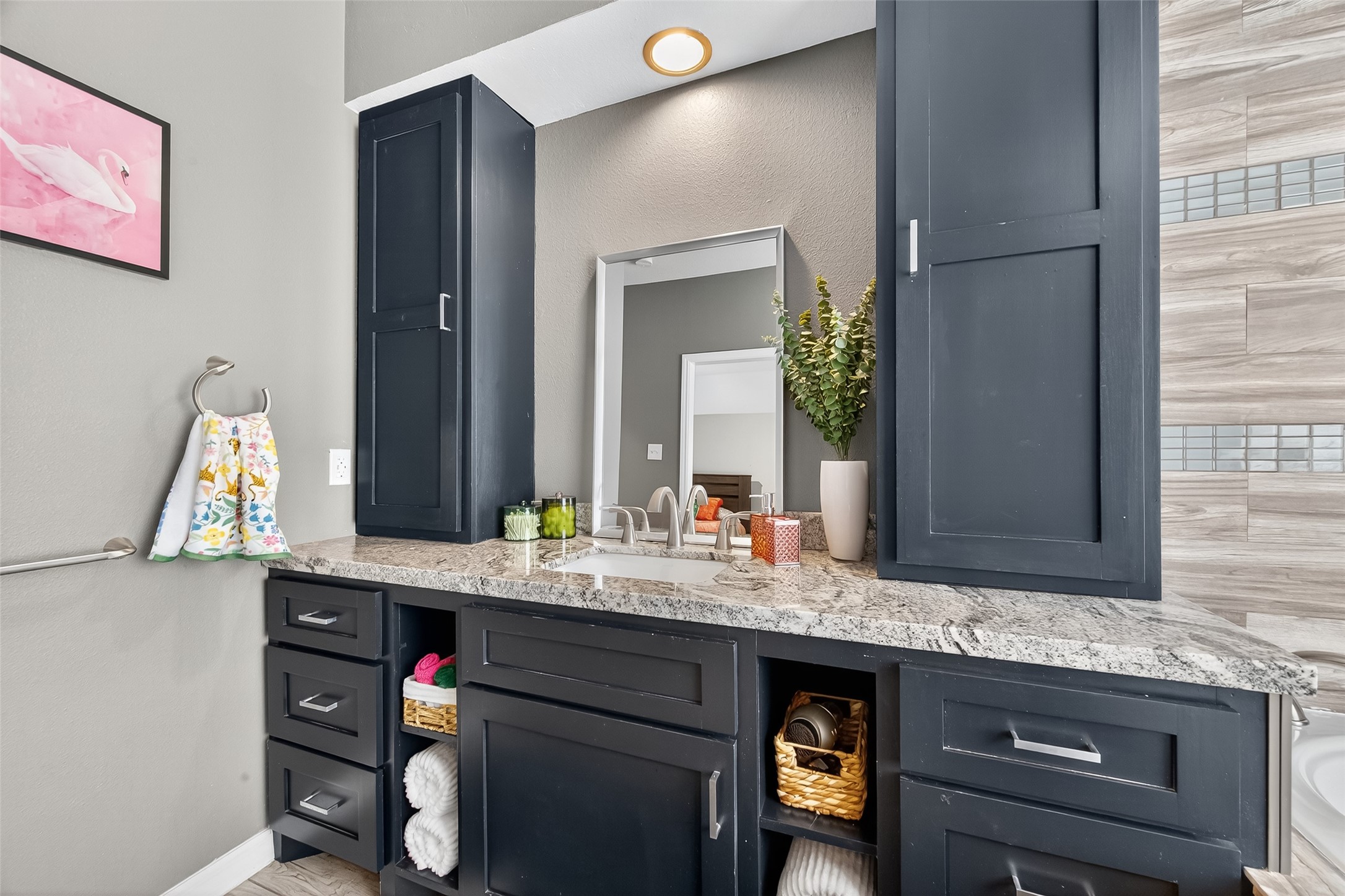 5310 Holly View Drive Houston, TX 77091 - Photo 33 of 38 a bathroom with a sink and a mirror
