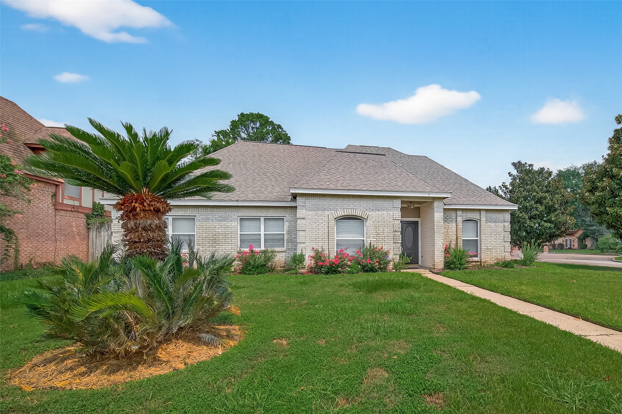 5310 Holly View Drive Houston, TX 77091 - Photo 36 of 38 a front view of house with yard and green space