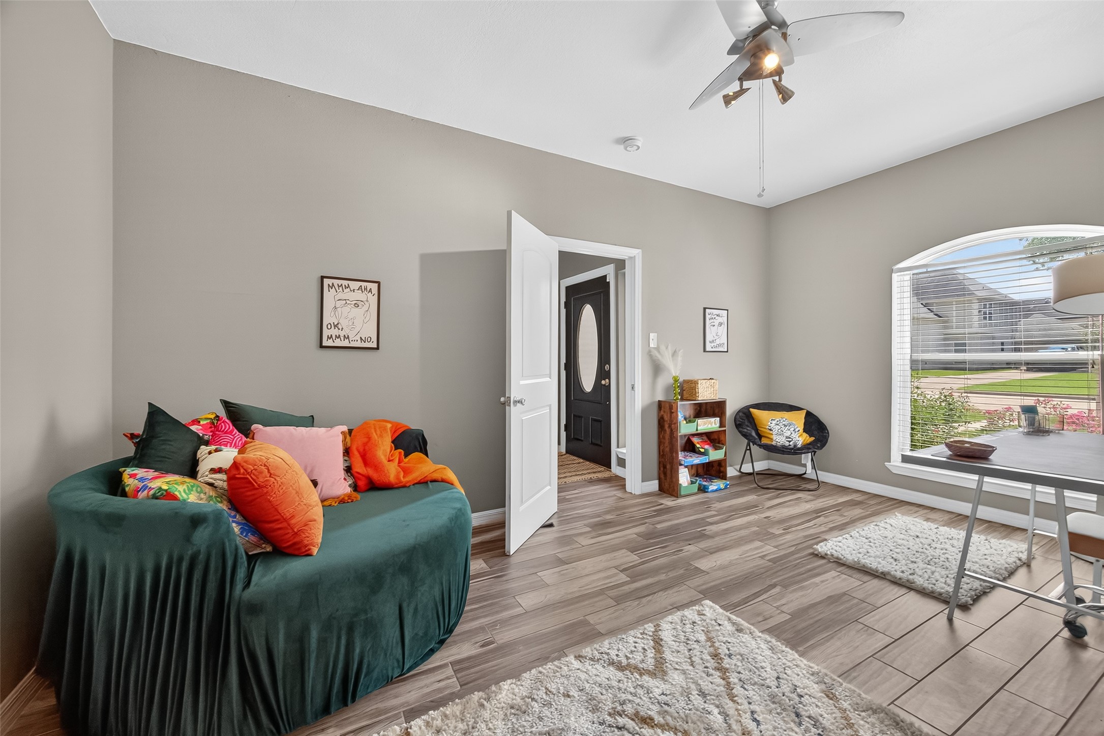 5310 Holly View Drive Houston, TX 77091 - Photo 4 of 38 a living room with furniture a couch and large window