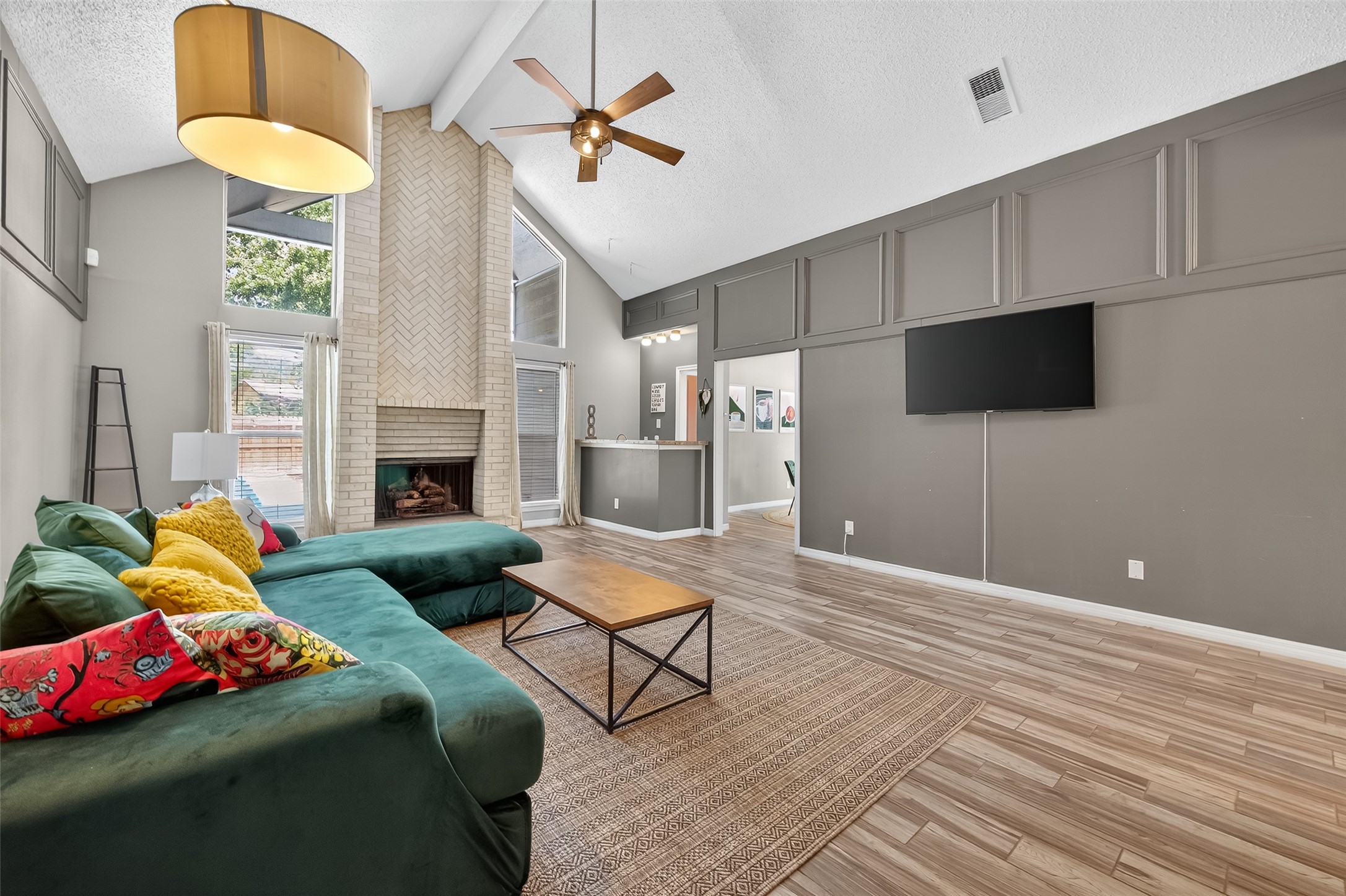 5310 Holly View Drive Houston, TX 77091 - Photo 9 of 38 a living room with furniture and a flat screen tv