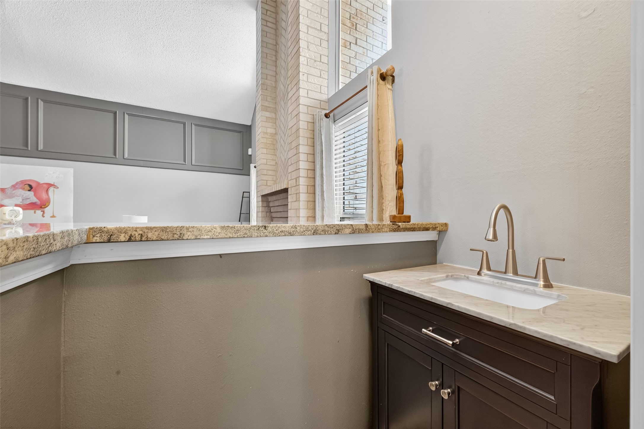 5310 Holly View Drive Houston, TX 77091 - Photo 10 of 38 a bathroom with a sink and a mirror