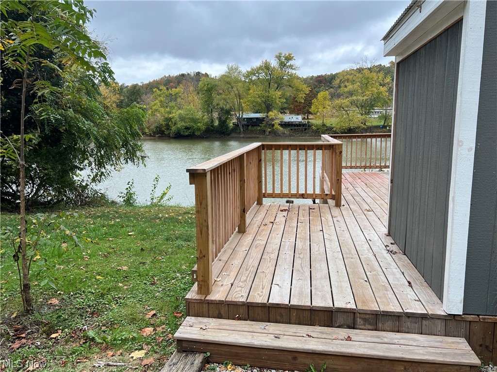 530 South Riverview Road Malta, OH 43758 - Photo 4 of 34 Wooden terrace featuring a water view