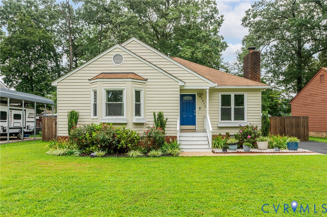 9815 Brenspark Road Chesterfield, VA 23832 - Photo 34 of 38 Cream-colored siding home featuring a blue entry d