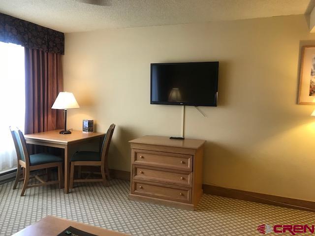 6 Emmons Road, Unit 268 Crested Butte, CO 81225 - Photo 5 of 13 a workspace with furniture and a window