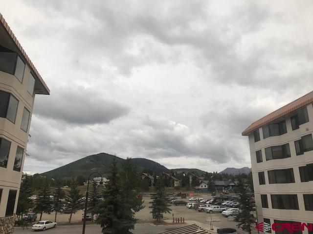 6 Emmons Road, Unit 268 Crested Butte, CO 81225 - Photo 7 of 13 a view of building with sky view