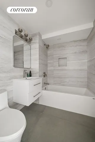 a bathroom with a bathtub and a sink