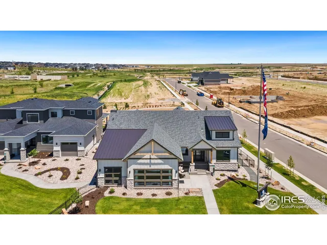 an aerial view of a house with a garden