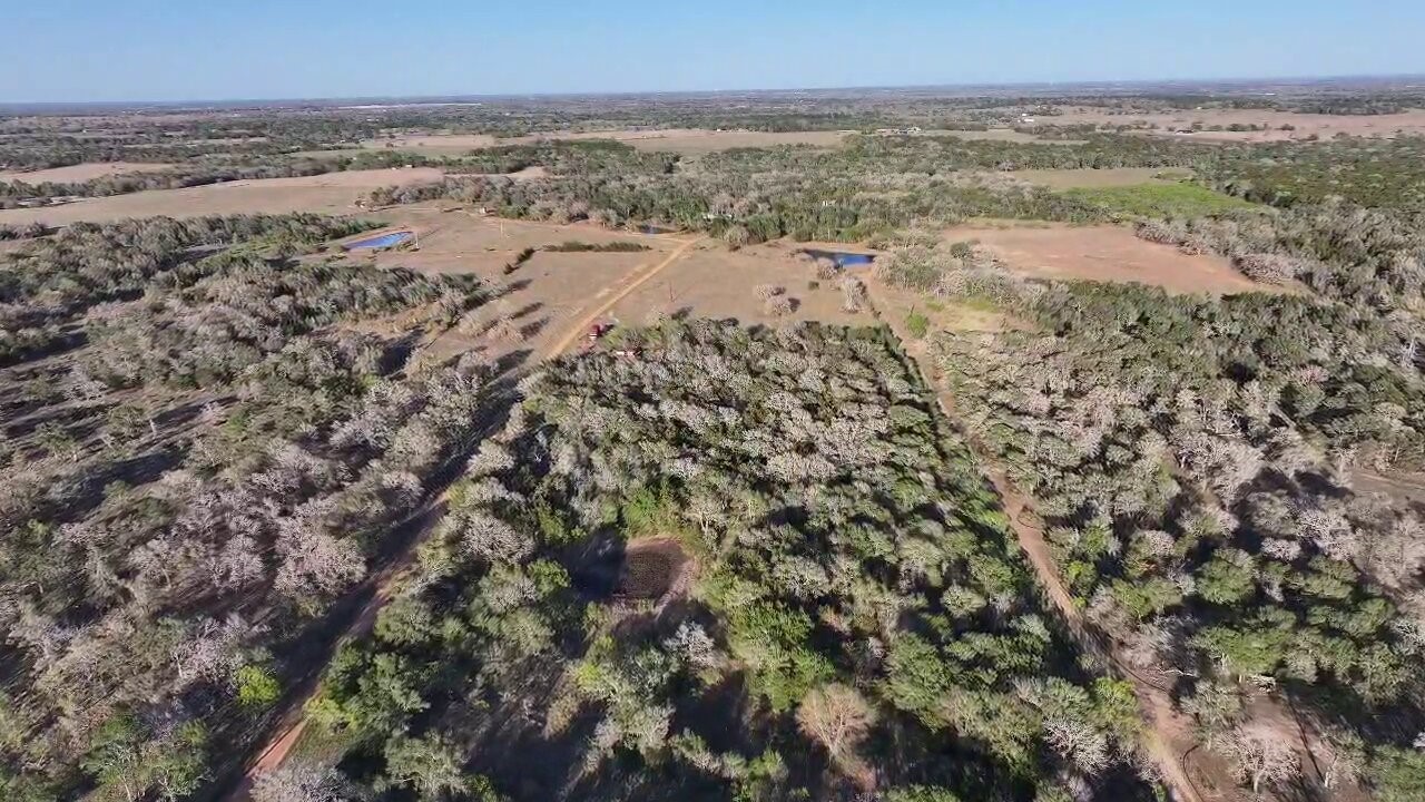 Tbd Lot 2 Tbd Road Paige, TX 78659 - Photo 1 of 25 an aerial view of residential houses with outdoor space