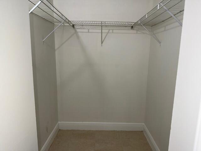 407 Meadows Circle, Unit 407 Boynton Beach, FL 33436 - Photo 23 of 38 Walking Closet
