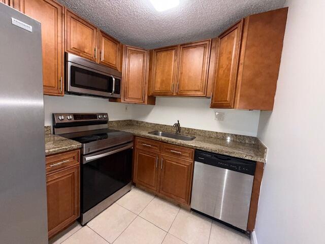 407 Meadows Circle, Unit 407 Boynton Beach, FL 33436 - Photo 4 of 38 Kitchen