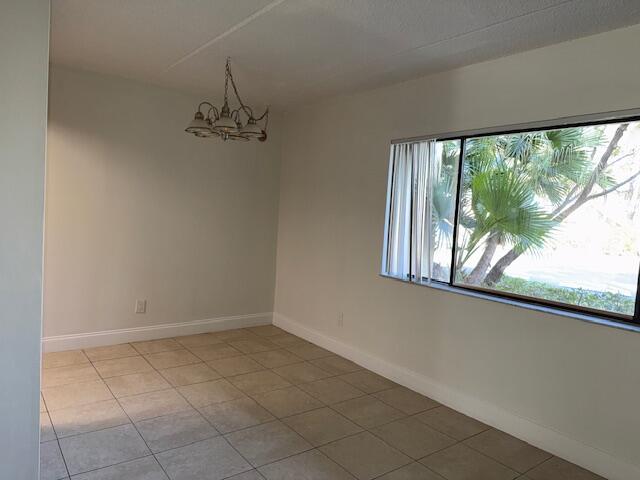 407 Meadows Circle, Unit 407 Boynton Beach, FL 33436 - Photo 6 of 38 Dining Room