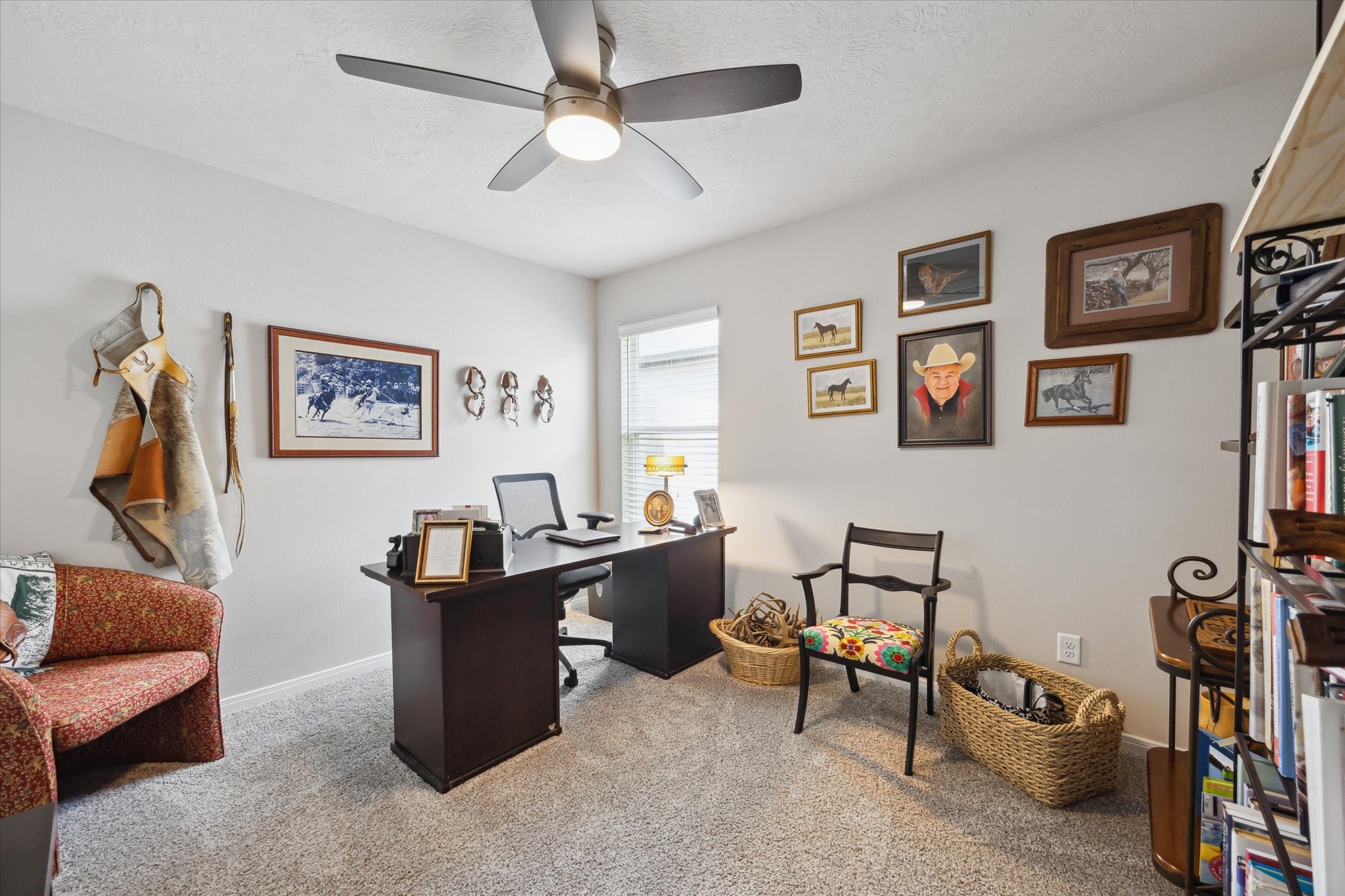 1010 Old Vine Road Brenham, TX 77833 - Photo 11 of 20 a view of a livingroom with workspace and a couch