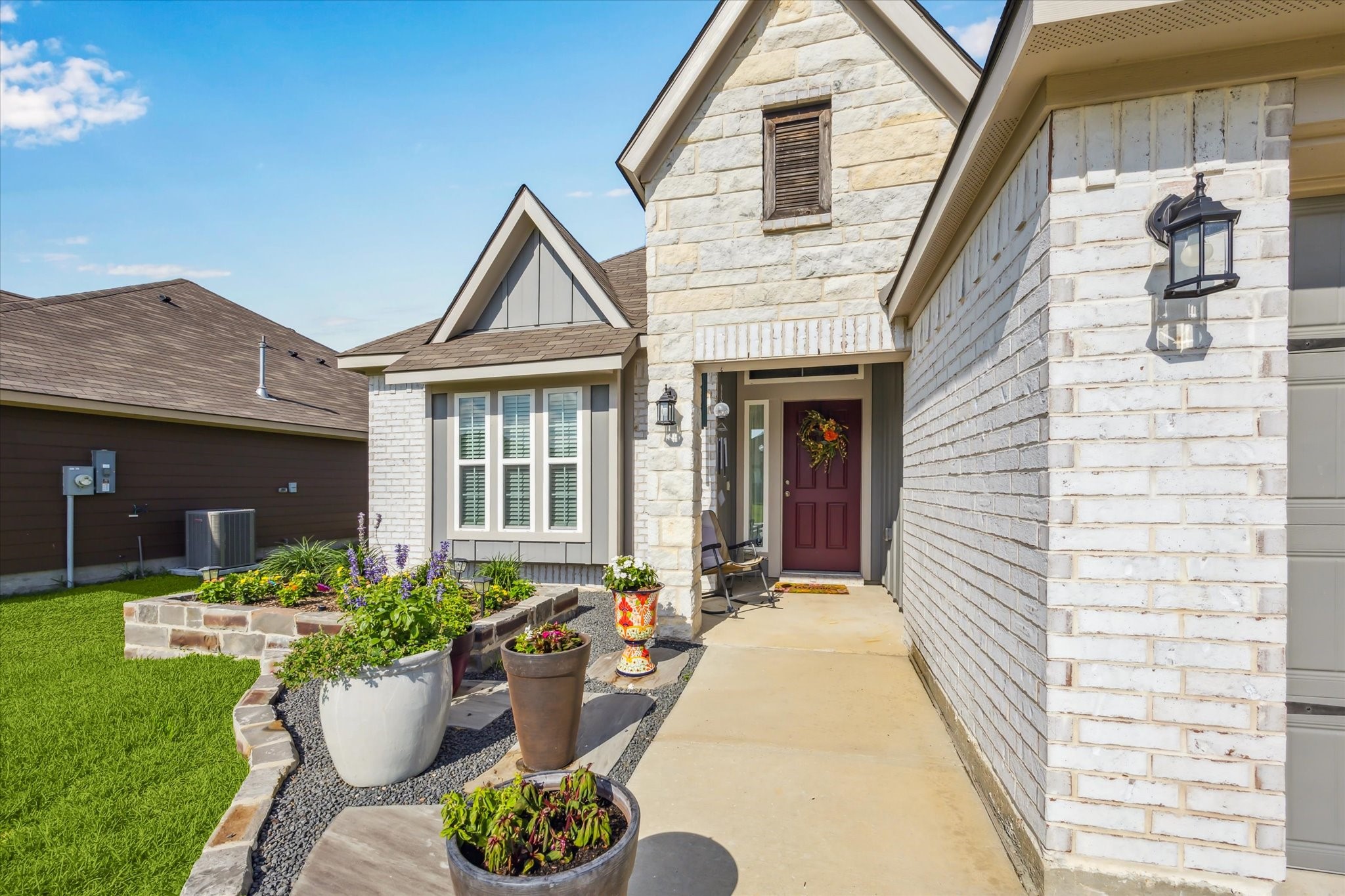 1010 Old Vine Road Brenham, TX 77833 - Photo 2 of 20 a front view of a house having patio