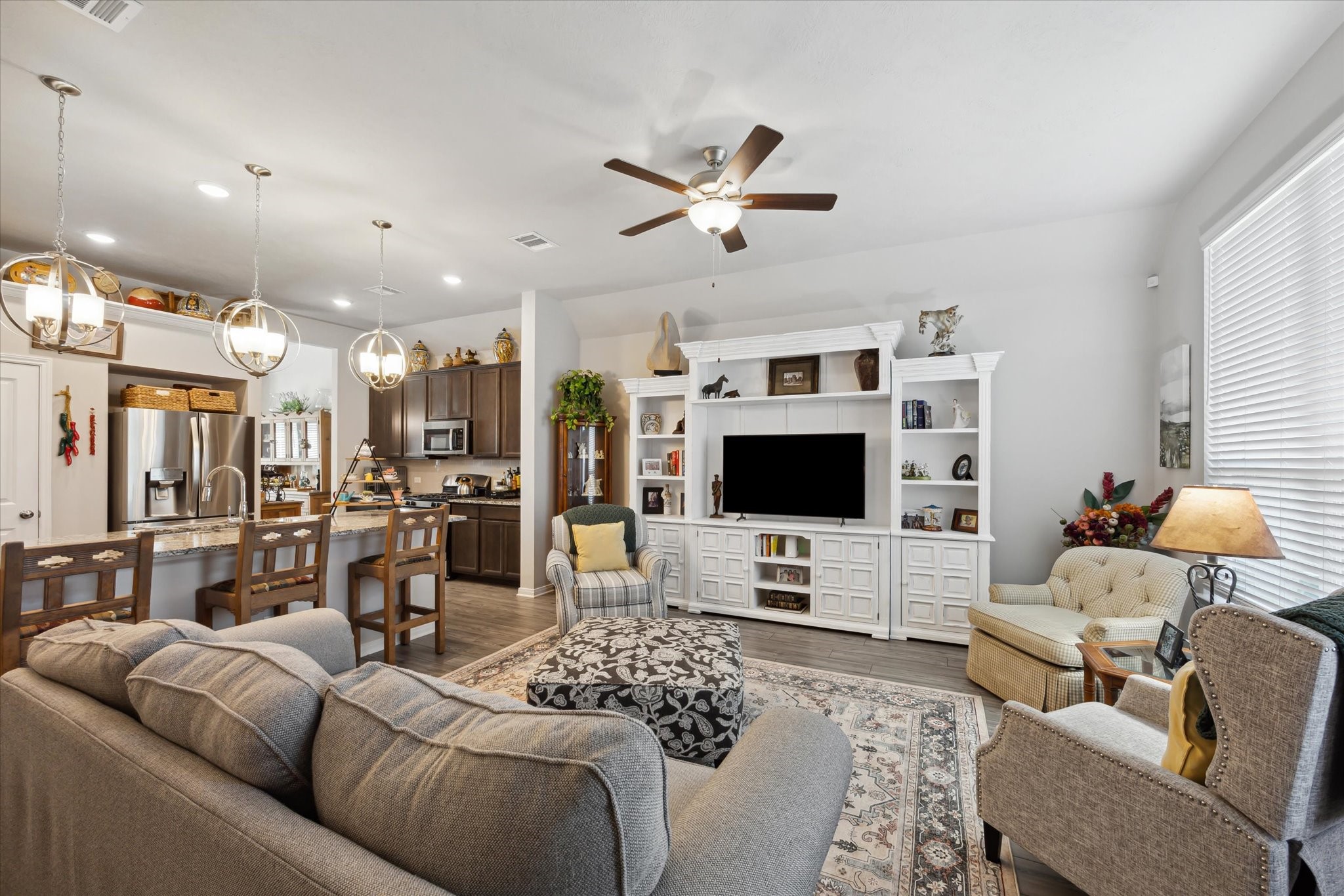 1010 Old Vine Road Brenham, TX 77833 - Photo 6 of 20 a living room with furniture and a flat screen tv