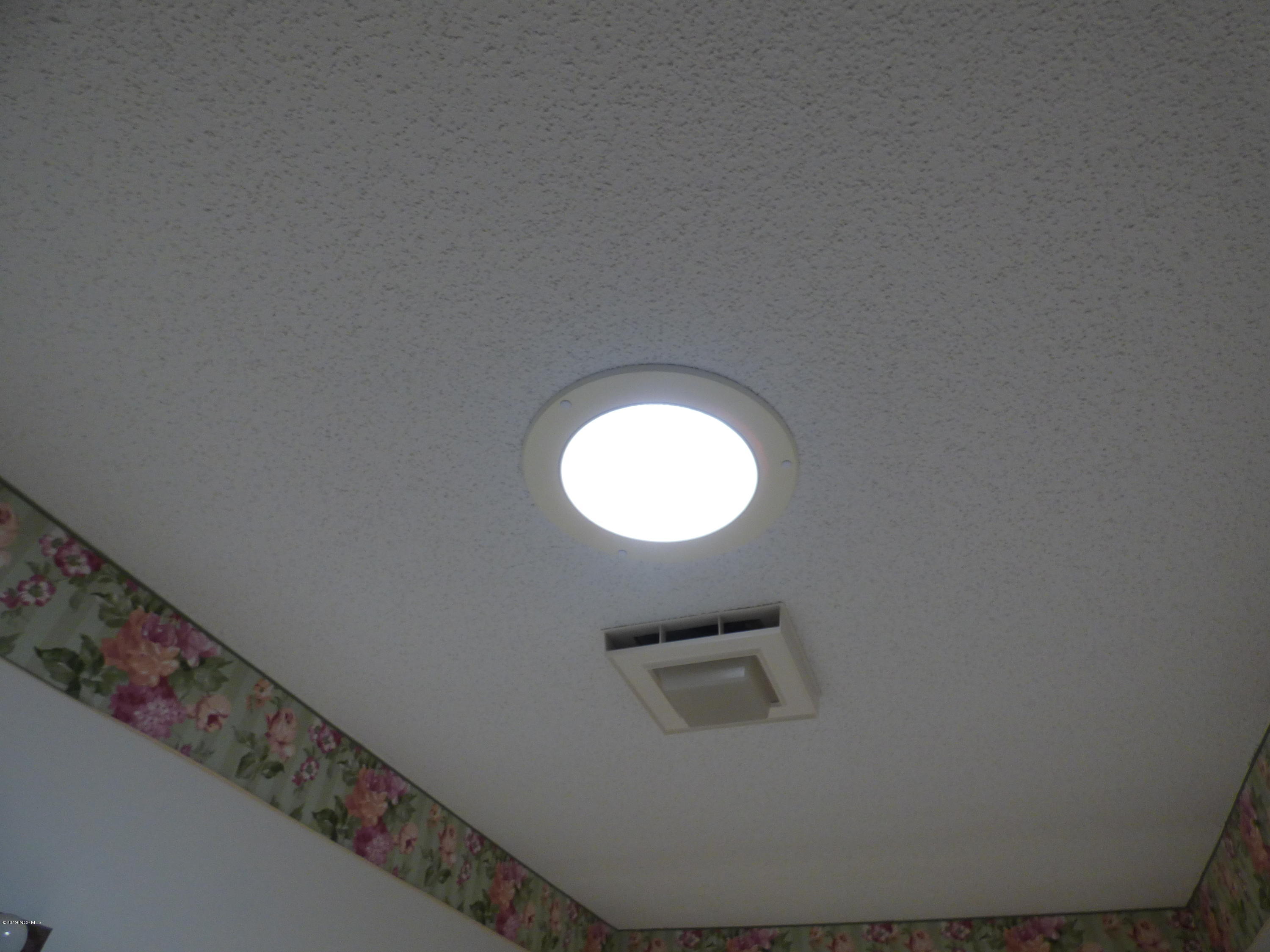 93 Cedar Tree Lane Southwest Calabash, NC 28467 - Photo 25 of 59 guest bath features solar lighting!