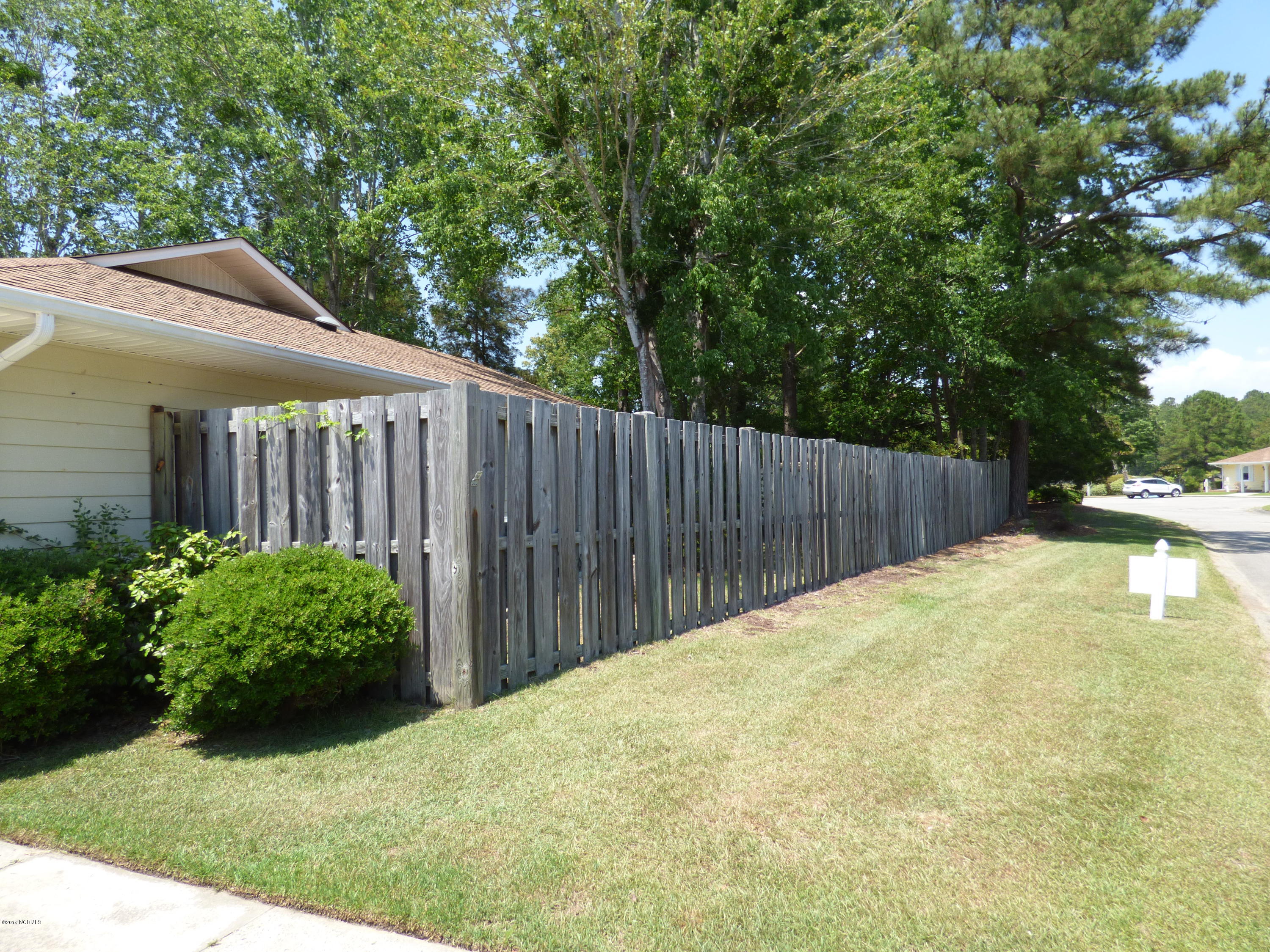 93 Cedar Tree Lane Southwest Calabash, NC 28467 - Photo 45 of 59 side front yard
