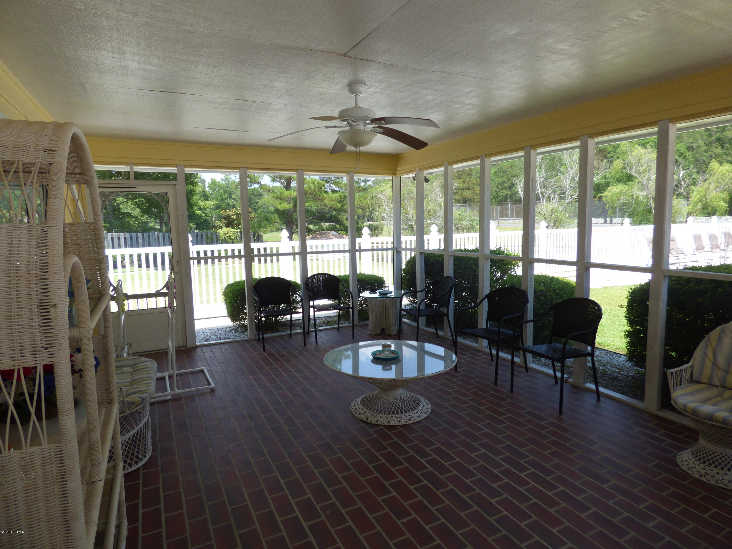 93 Cedar Tree Lane Southwest Calabash, NC 28467 - Photo 49 of 59 pool screen room