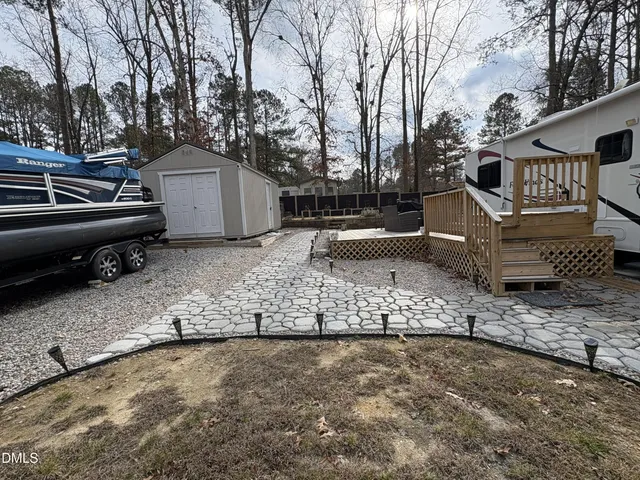 a view of wooden fence and a window