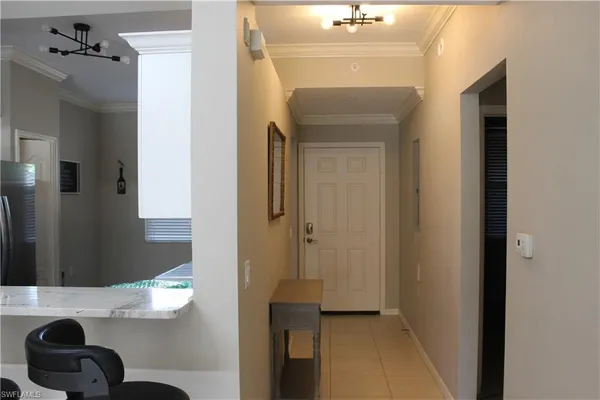 a view of hallway with mirror
