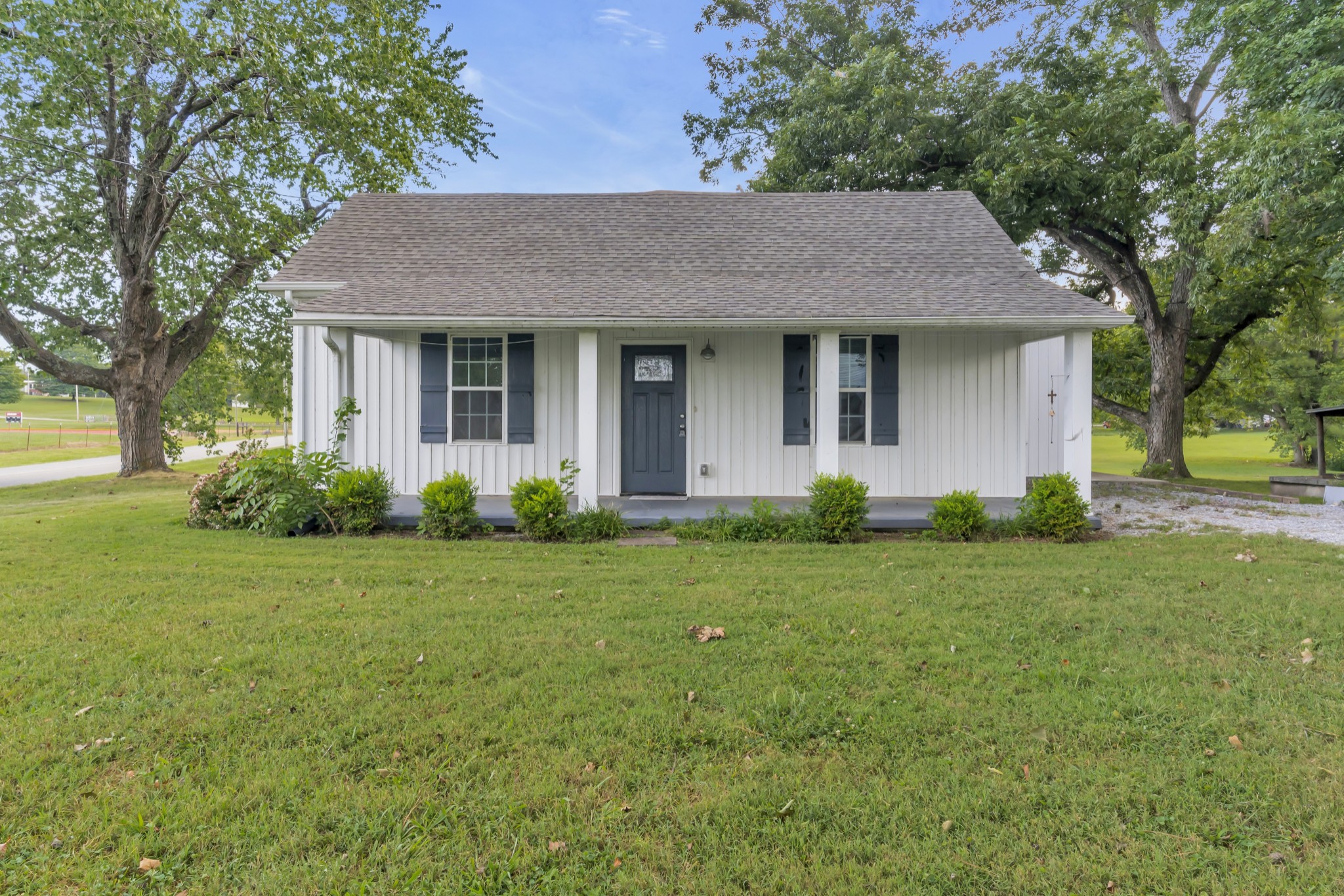 214 Maple Street Adams, TN 37010 - Photo 1 of 48 Darling renovated farmhouse on corner lot