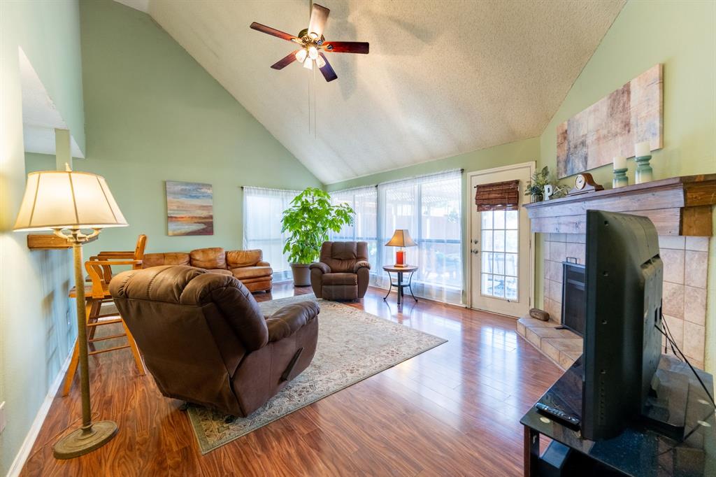1611 Mission Ridge Trail Carrollton, TX 75007 - Photo 13 of 35 a living room with furniture and a flat screen tv