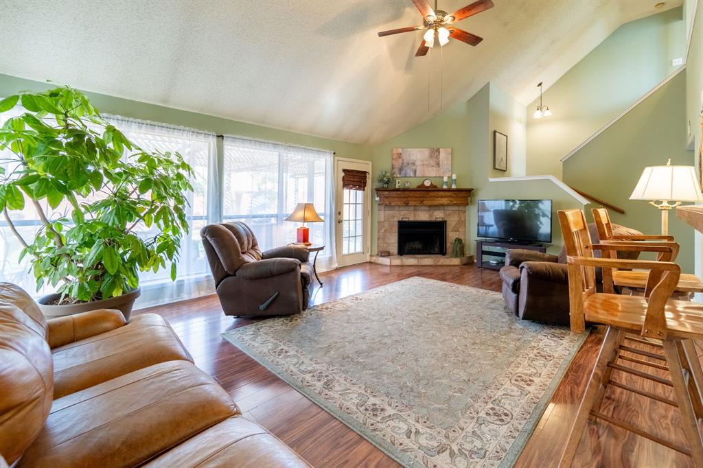 1611 Mission Ridge Trail Carrollton, TX 75007 - Photo 9 of 35 a living room with furniture fireplace and window