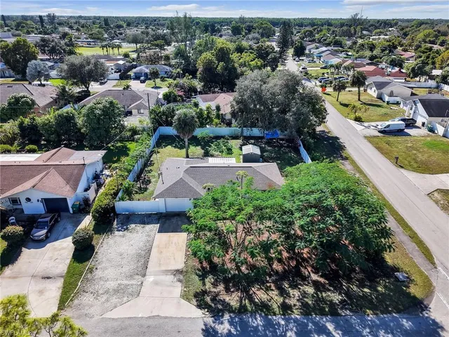 an aerial view of a house with a garden