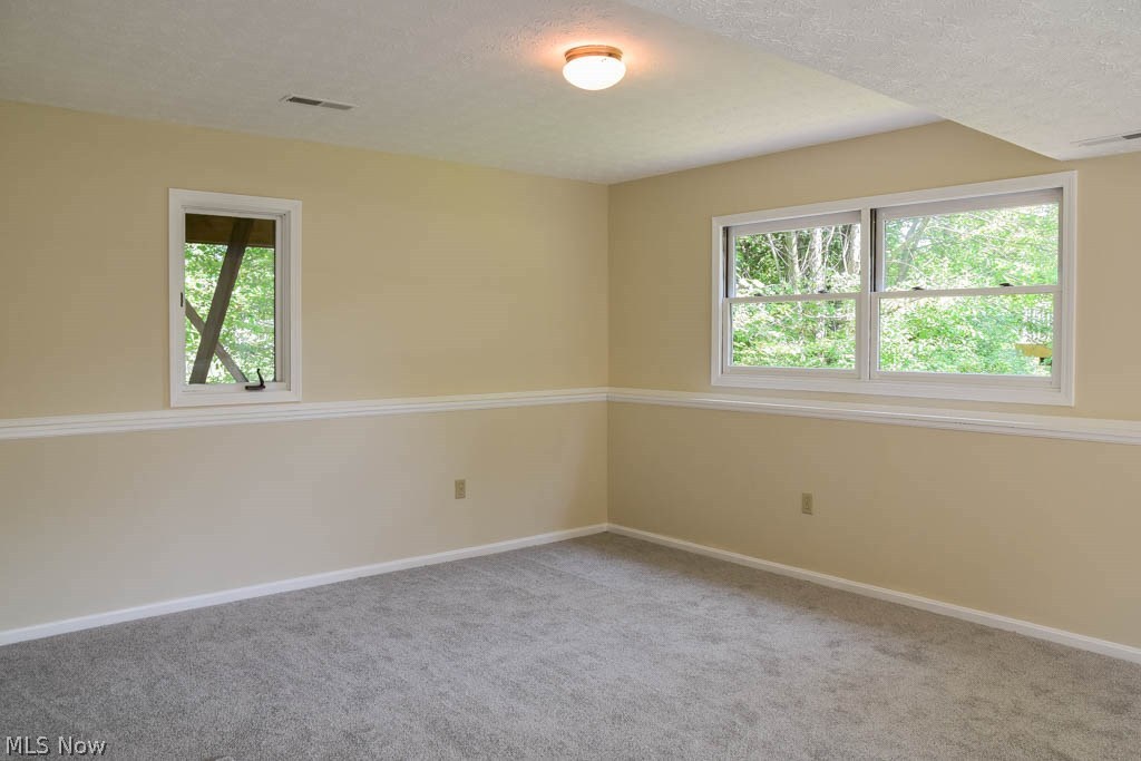 3837 Martha Road Kent, OH 44240 - Photo 10 of 22 Finished lower level with a rec room that could be turned into a fourth bedroom if needed.
