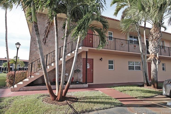 1919 Southwest Palm City Road, Unit H Stuart, FL 34994 - Photo 1 of 27 FRONT BUILDING EXTERIOR