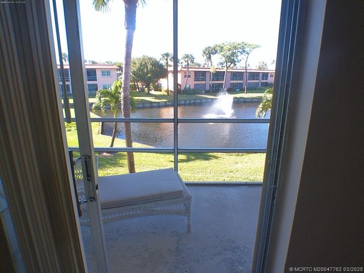 1919 Southwest Palm City Road, Unit H Stuart, FL 34994 - Photo 3 of 27 FOUNTAIN VIEW AND SOUNDS FROM INSIDE THE UNIT