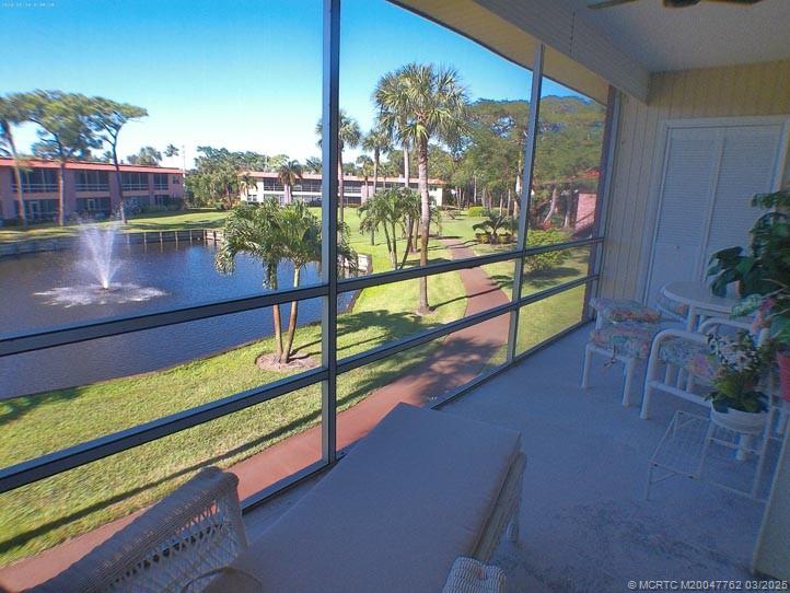 1919 Southwest Palm City Road, Unit H Stuart, FL 34994 - Photo 4 of 27 LANAI FOUNTAIN VIEW