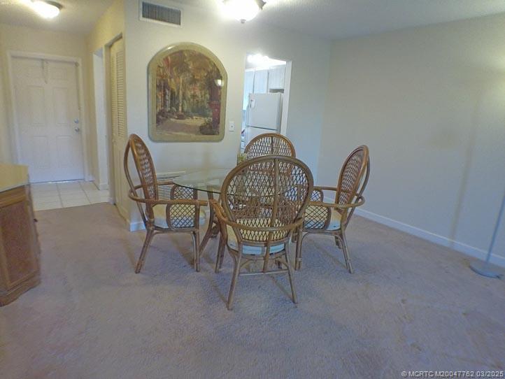 1919 Southwest Palm City Road, Unit H Stuart, FL 34994 - Photo 9 of 27 DINING