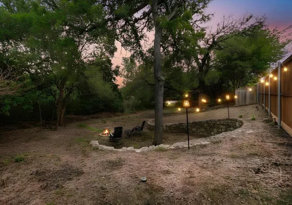 a view of a backyard with green space