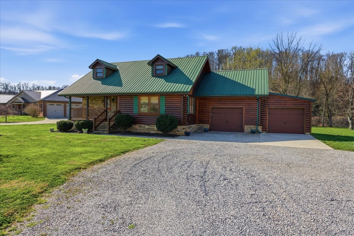 854 Holston Shores Drive Rutledge, TN 37861 - Photo 49 of 52 a front view of a house with garden