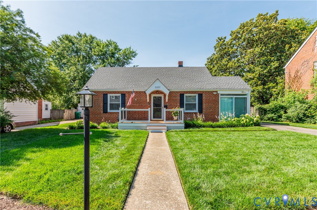 2107 Lennox Road Henrico, VA 23228 - Photo 2 of 47 Red brick exterior featuring a covered porch with