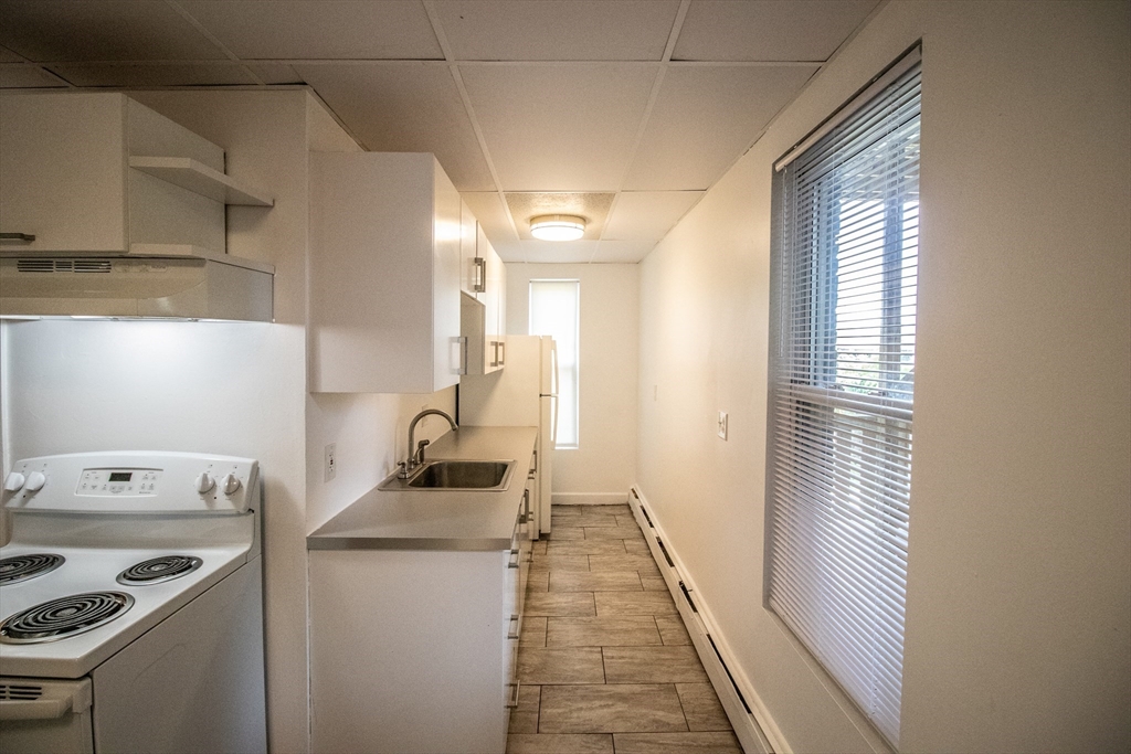 91 Elm Street Holyoke, MA 01040 - Photo 19 of 32 a room with a washer and dryer