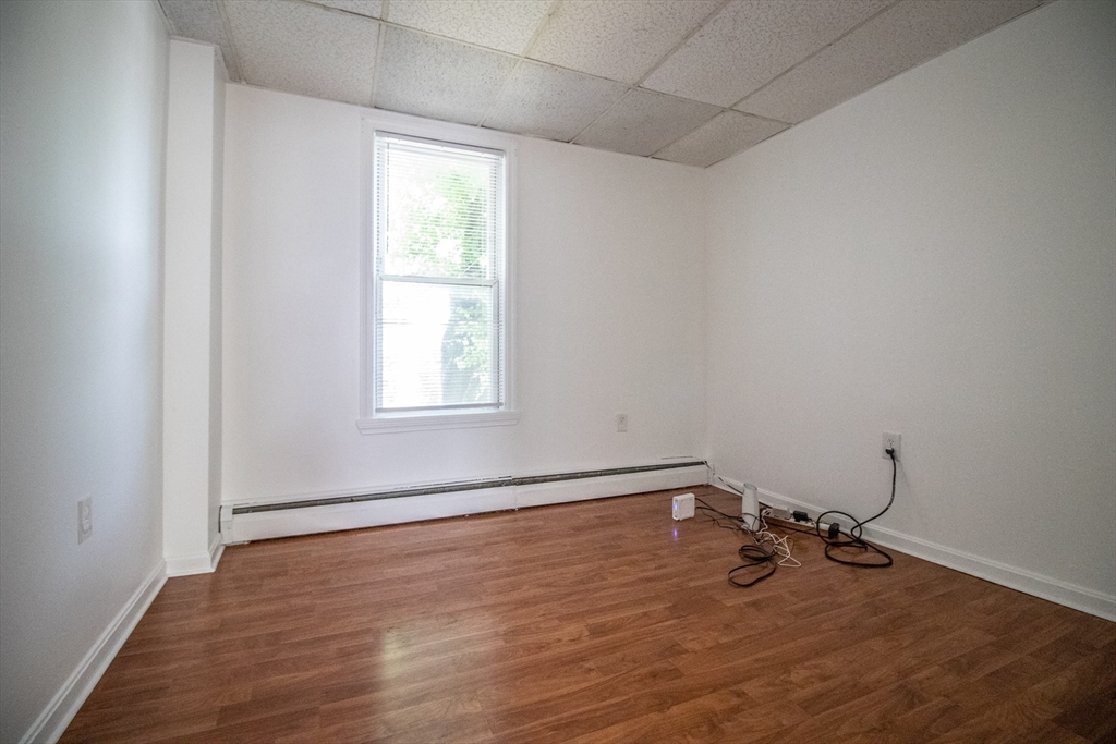 91 Elm Street Holyoke, MA 01040 - Photo 23 of 32 an empty room with a window